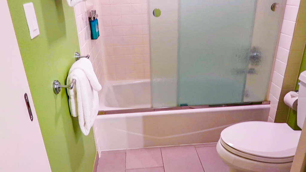 picture of toilet and shower in a standard room at all star movies resort