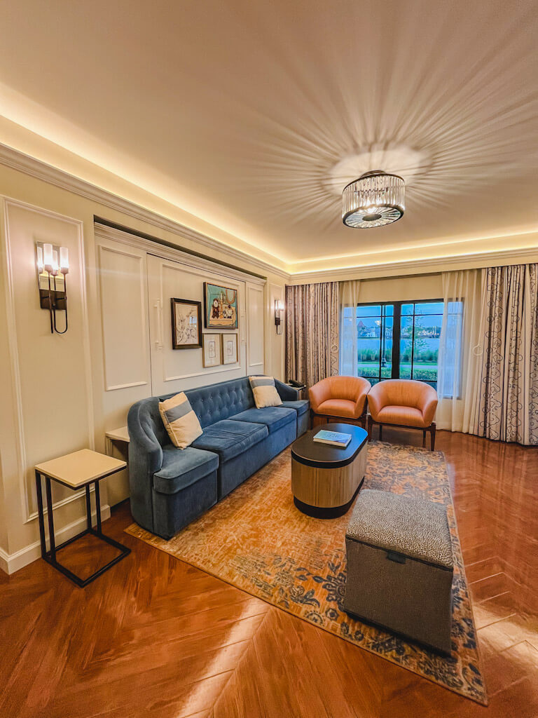 living space with couch, chairs and tables at Disney's Riviera Resort.
