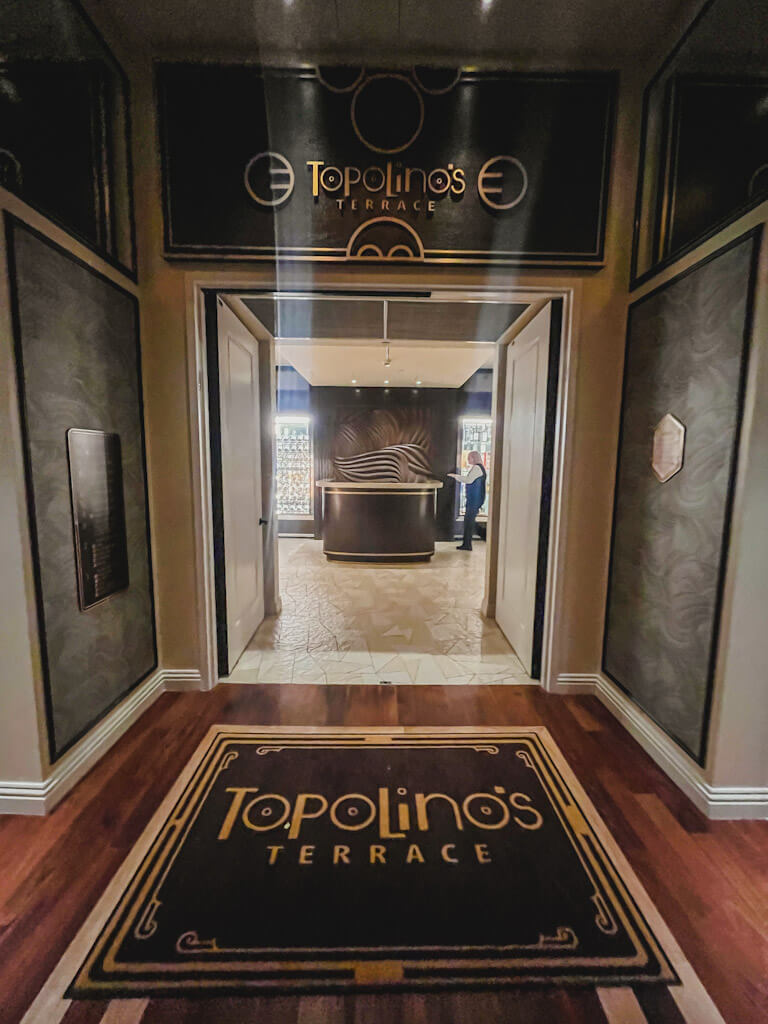 entrance to Topolino's Terrace, the table service restaurant at Disney's Riviera Resort.