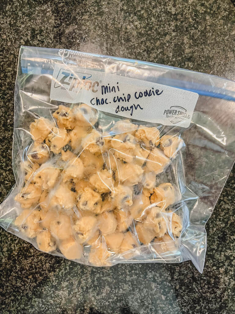 frozen cookie dough balls in a gallon freezer ziplock bag.