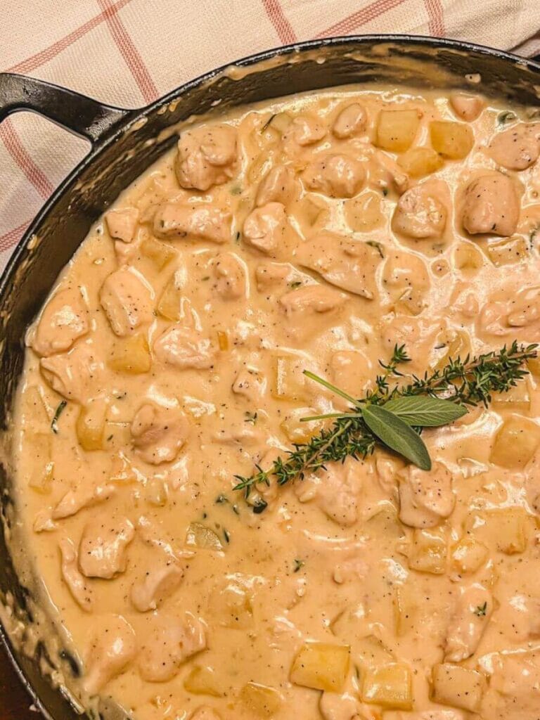 creamy chicken and herby potato skillet with fresh sage and thyme.