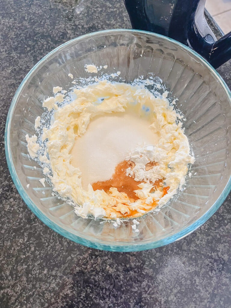 cream cheese mixture in a small glass mixing bowl.