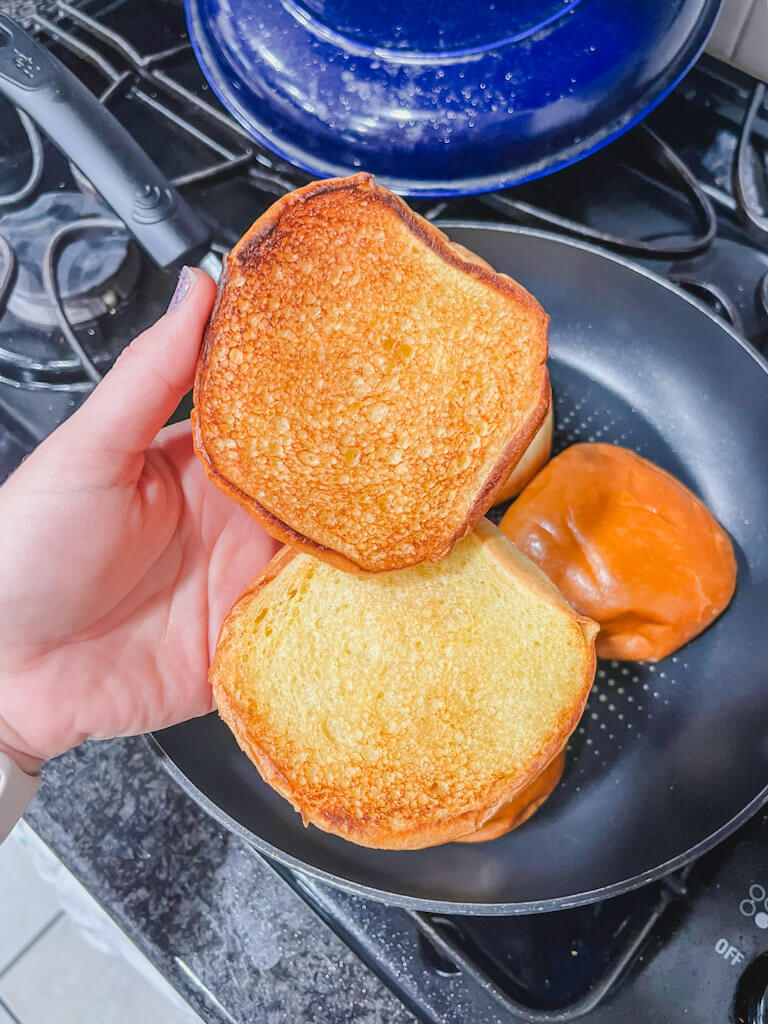 showing a golden brown brioche bun once it's finished toasting.