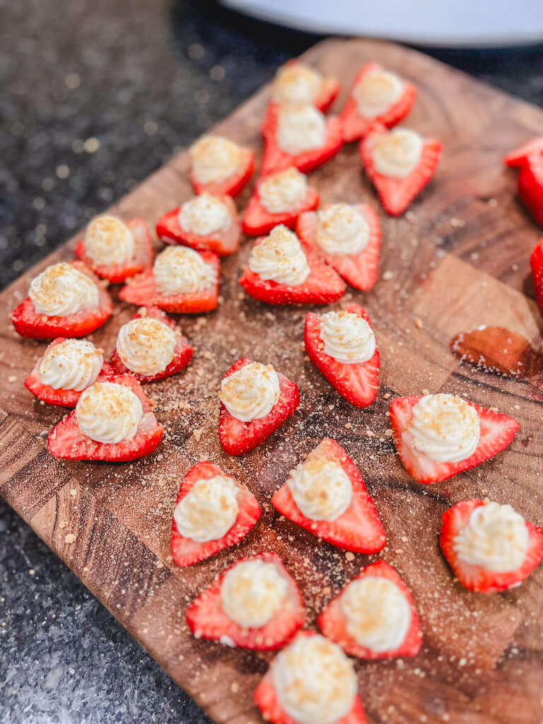 deviled strawberries topped with crushed graham crackers.