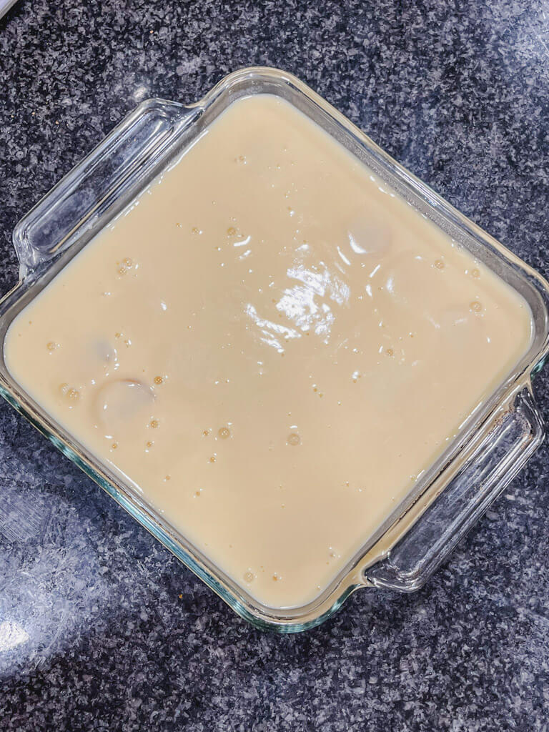 the remaining pudding mixture poured over the top of the banana pudding.