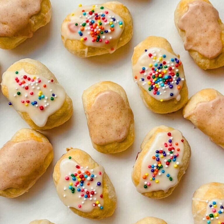 close up of mini pop tart bites on a white board.