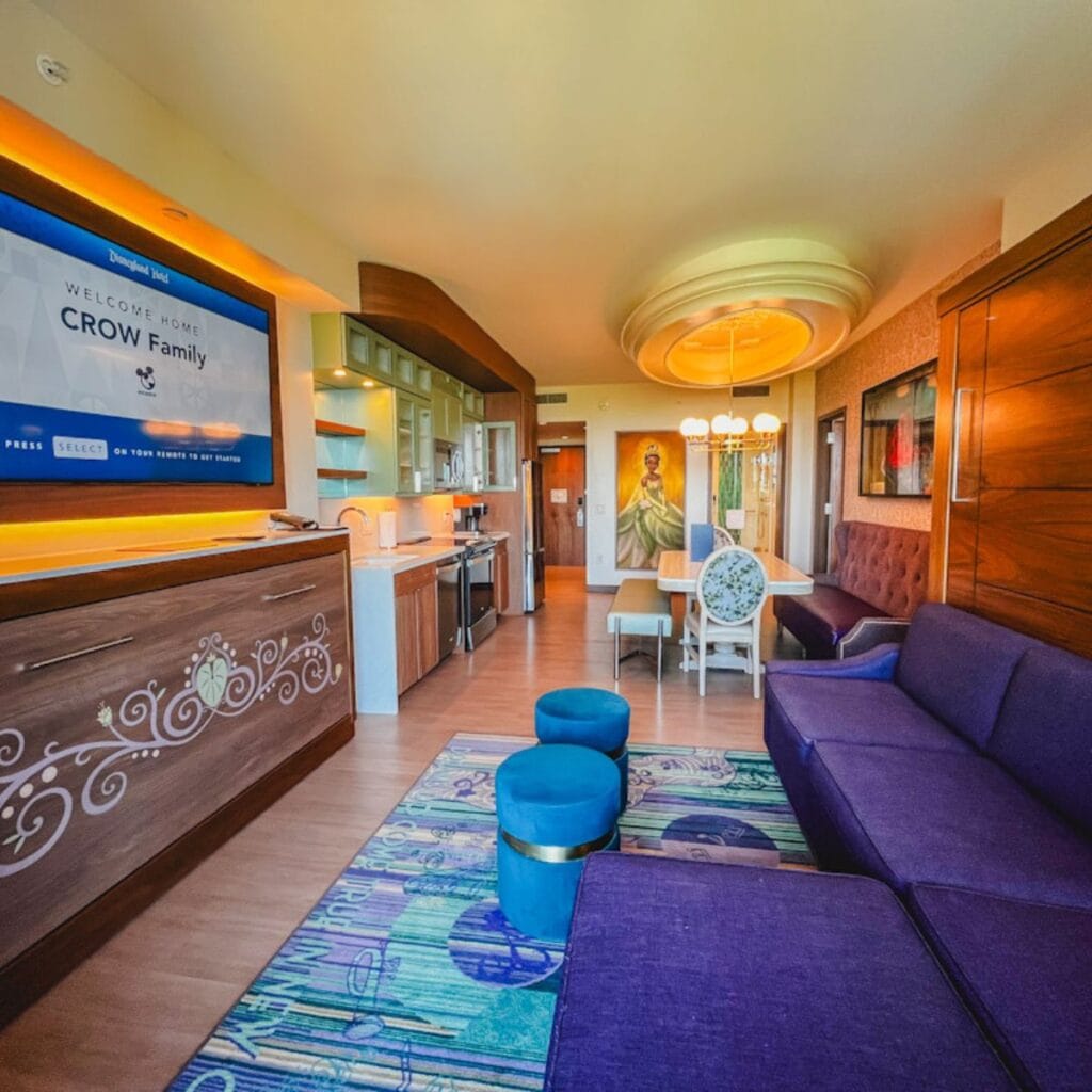 the living room, kitchen, and dining area in a one bedroom villa at Disneyland Hotel.