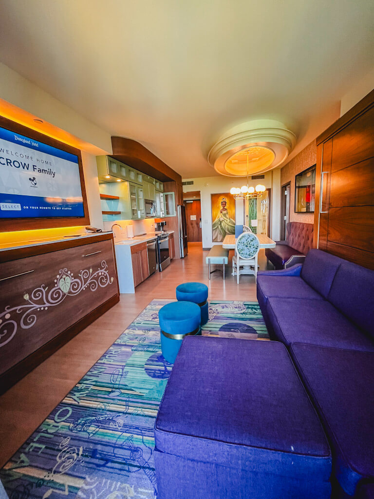 view of living room, dining room and kitchen from the balcony area of a one bedroom villa at Disneyland Hotel