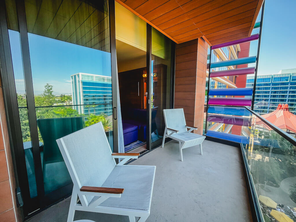 two chairs on the balcony of our one bedroom villa at Disneyland Hotel.