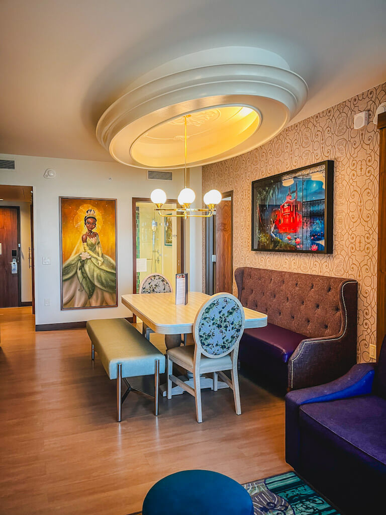 view of the dining room table and art work in a one bedroom villa at Disneyland Hotel.