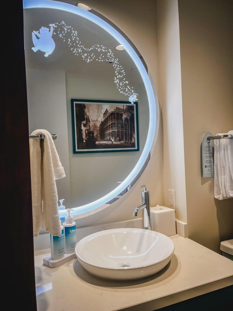 sink and mirror in guest bathroom in a one bedroom villa at Disneyland Hotel.