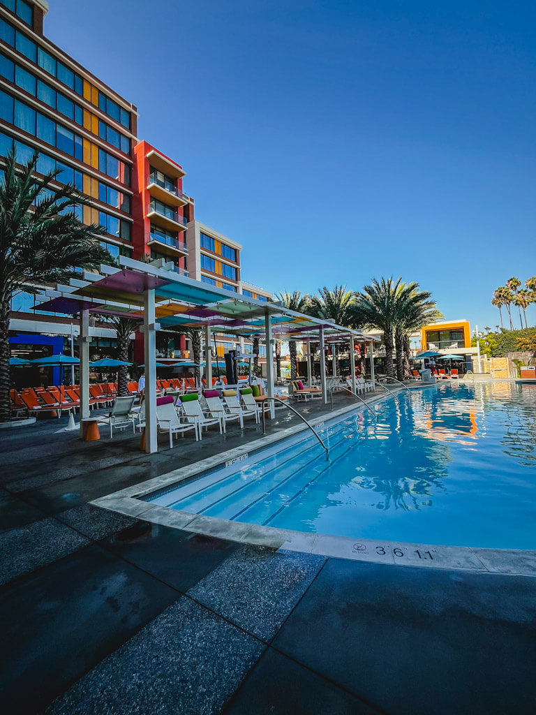 Palette pool area with the Discover Tower in the background at the Disneyland Hotel.