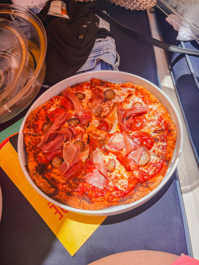 a personal Charcuterie pizza poolside at the Disneyland Hotel.