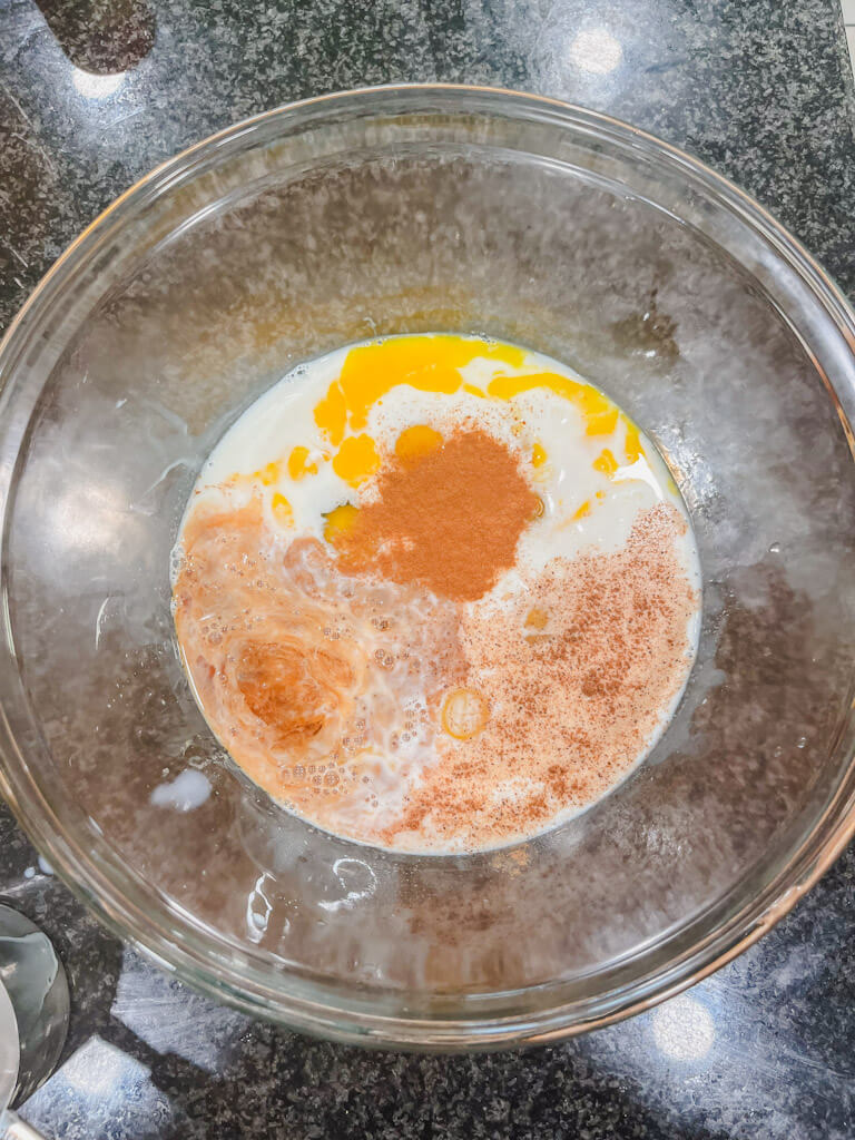 vanilla extract, cinnamon and nutmeg added to the large bowl with milk and eggs for overnight French toast casserole.
