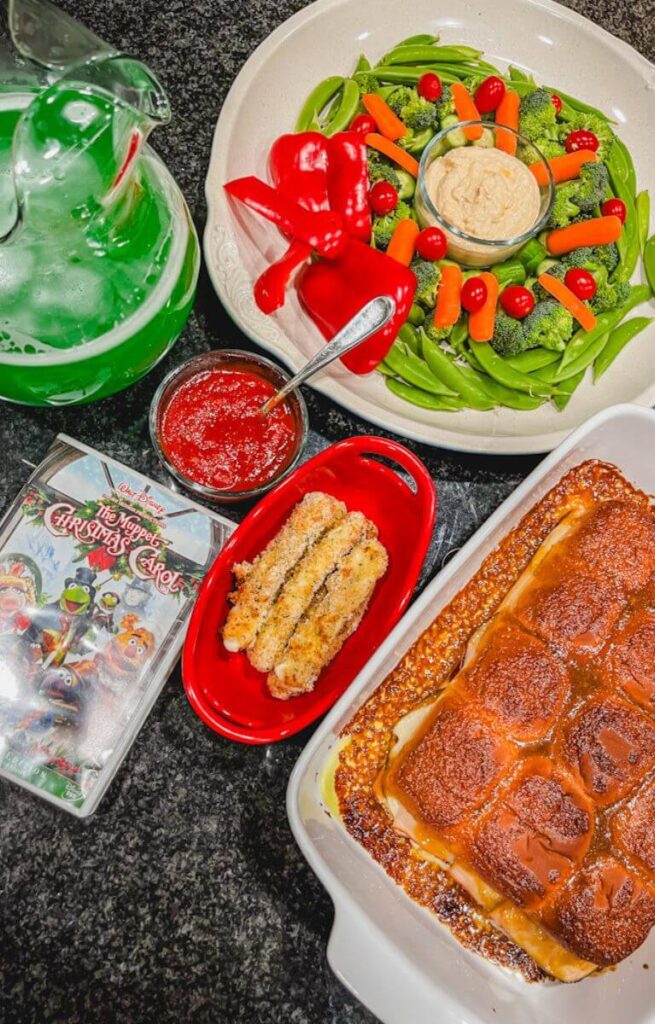 overhead image of the food laid out on a counter for the muppet christmas carol movie night.