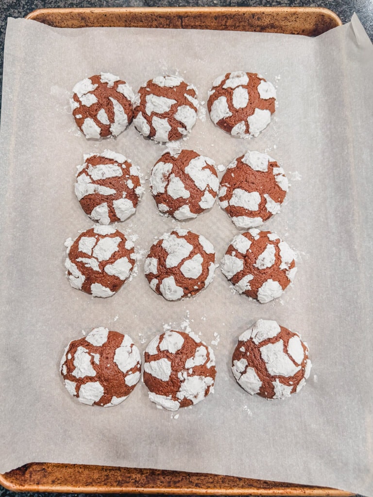 chocolate crinkle cookies after baking in the oven for 12 minutes.