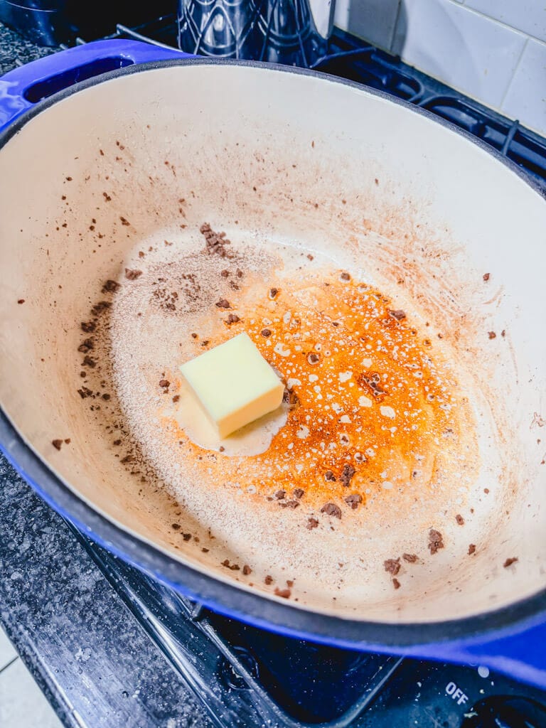 Butter added to the same Dutch oven about to melt.