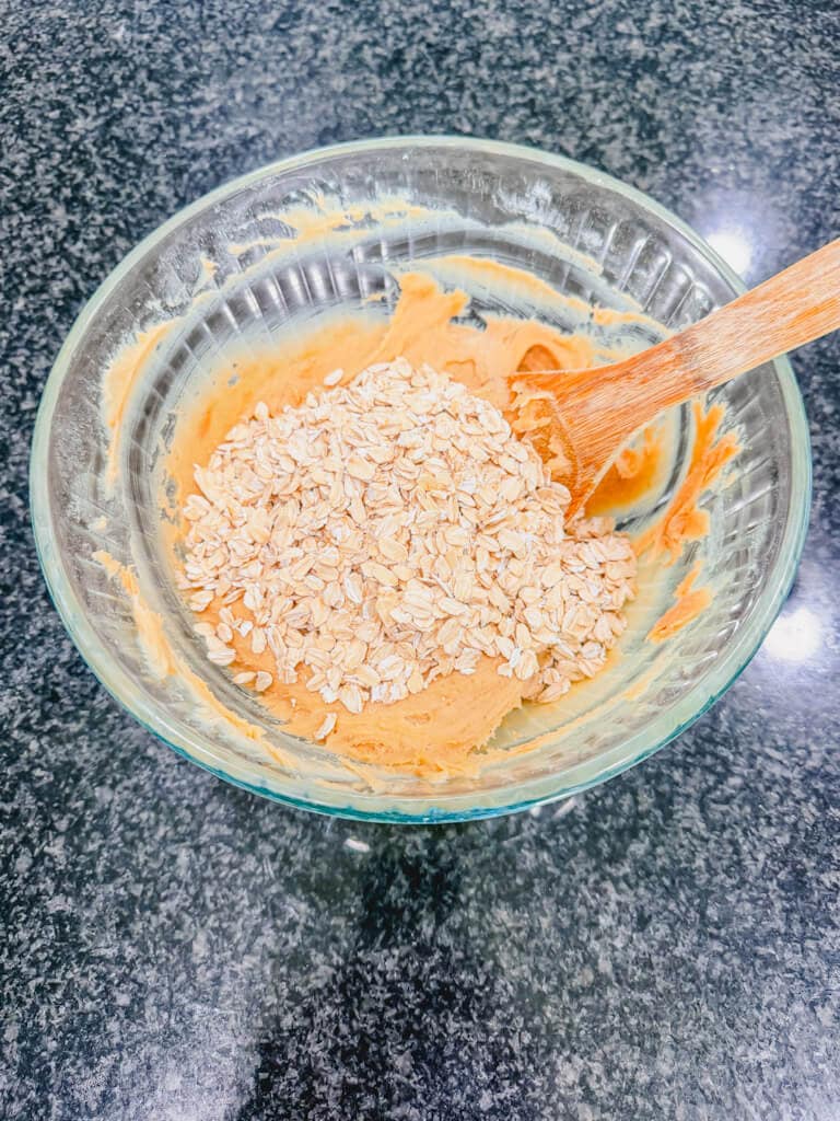 Old-fashioned oats added to the mixing bowl.