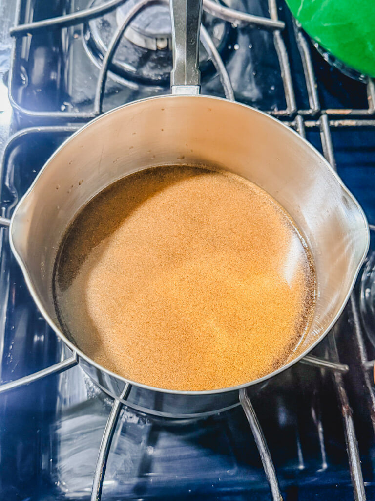 Homemade teriyaki sauce mixture in saucepan before cooking.