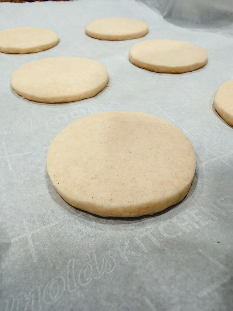 Cookies cooling on the baking sheet for five minutes.