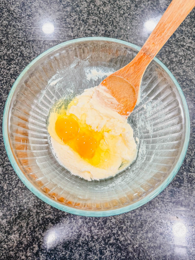 Two eggs added to the butter mixture.
