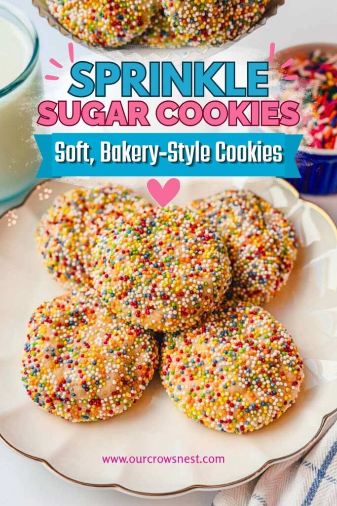 Sprinkle Sugar Cookies on a white scalloped plate with a glass of milk in the background.