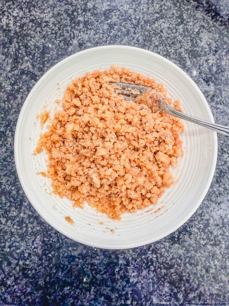 Finished cinnamon streusel crumble mixed together in a bowl.