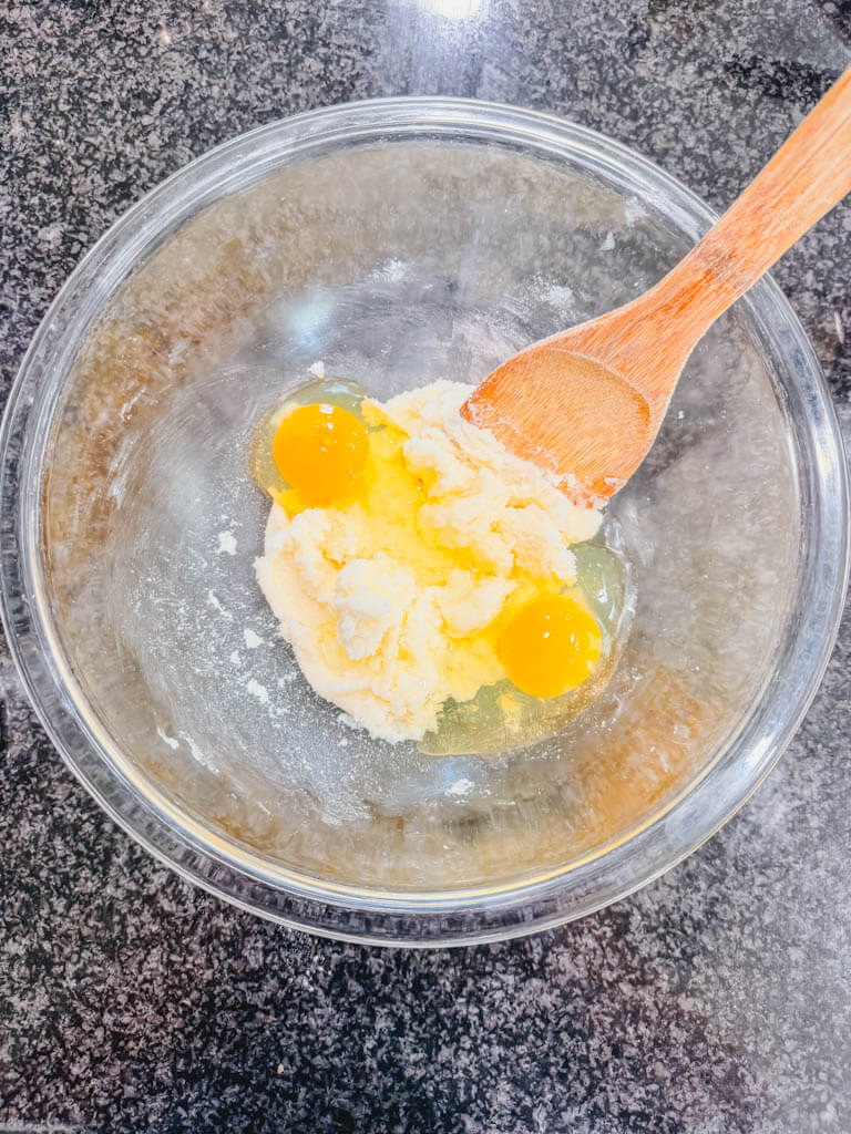 Eggs added to the creamed butter and sugar mixture.