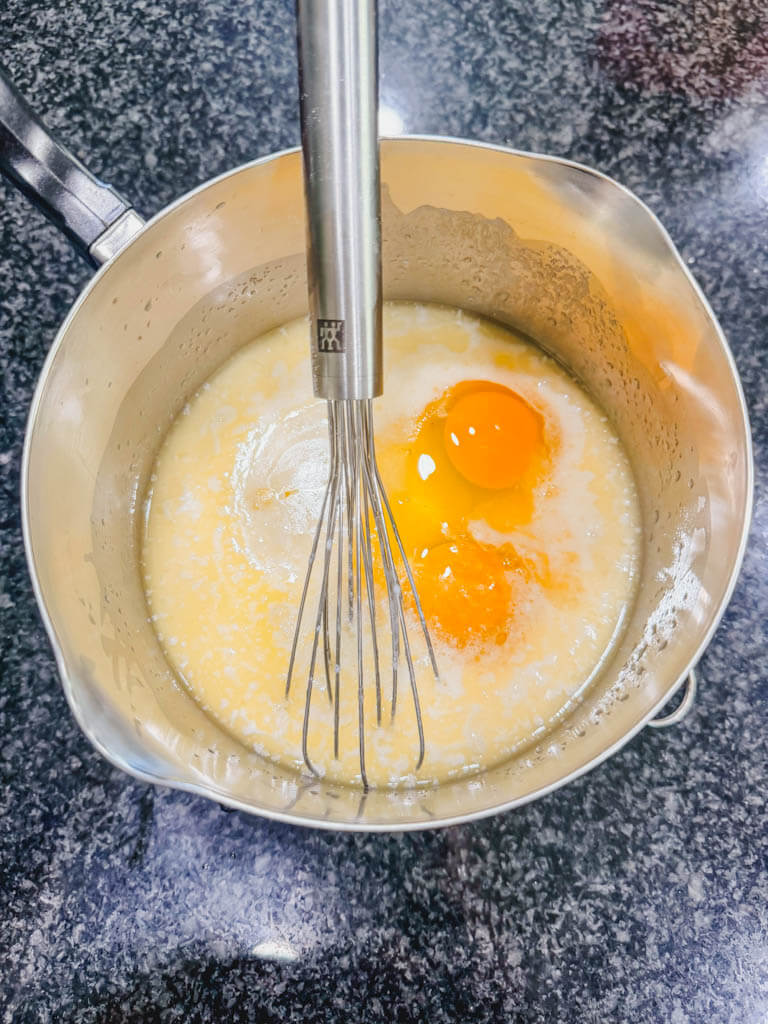 Two room-temperature eggs added to the cornbread batter.