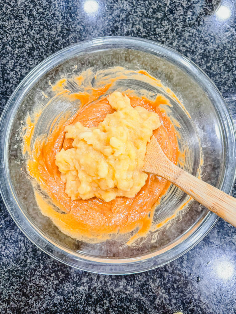 Mashed overripe bananas added to Biscoff cookie butter banana bread batter.