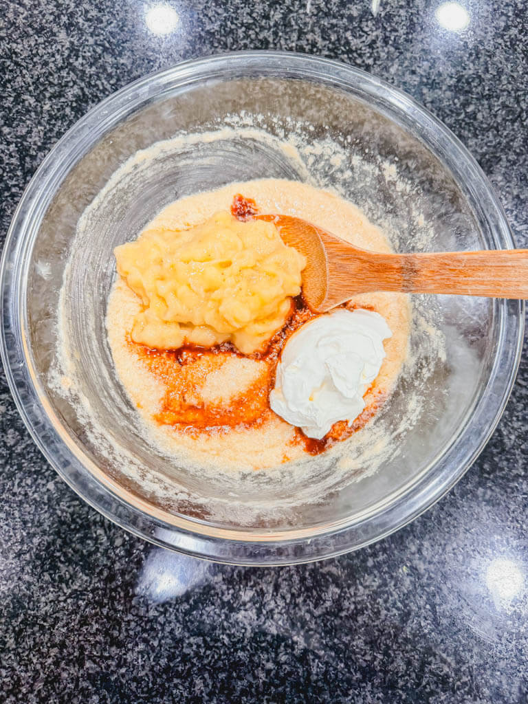 Mashed ripe bananas and sour cream added to banana muffin batter.
